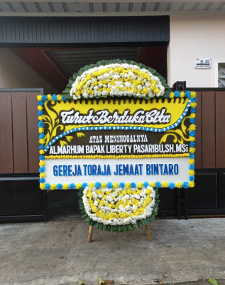 Papan Bunga Duka di Pekutatan